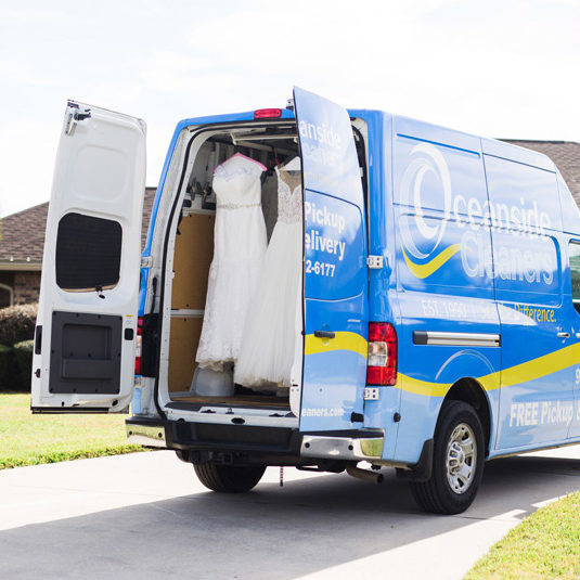 Delivery van with wedding dresses